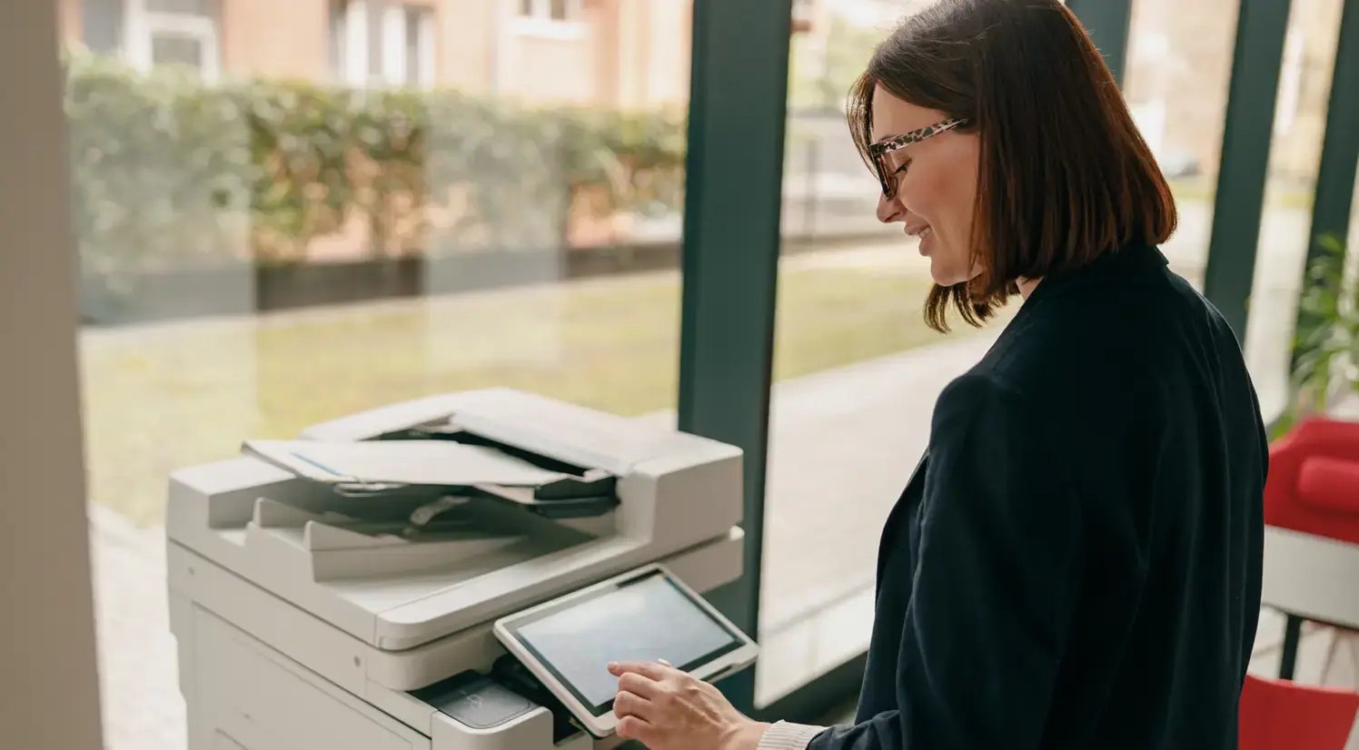 office worker applying printer settings